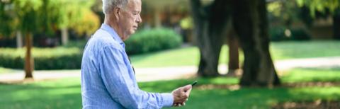 Man walking with his phone