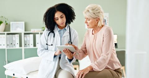 Doctor talking with patient