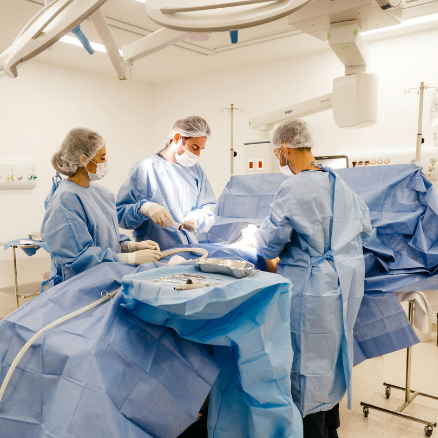 Surgeons over operating table