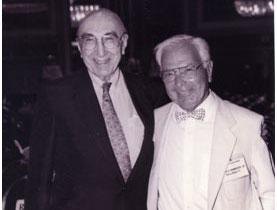 At left: Michael E. DeBakey, M.D. (left), Harris B. Shumacker, Jr., M.D.